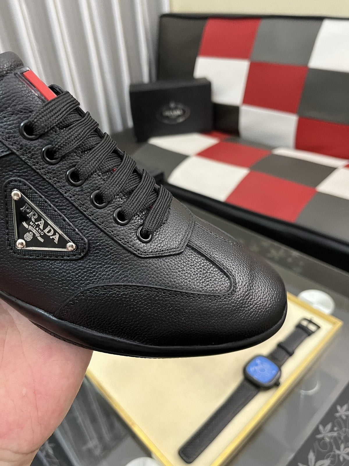 Prada Black Lace-Up Sneakers with Red Tab