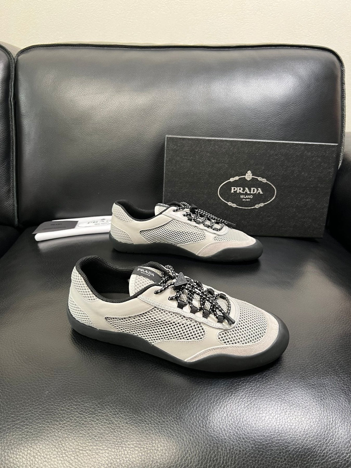 Prada White, Gray & Black Low-Top Sneakers